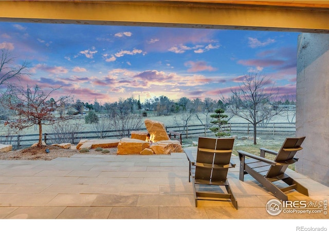 view of patio / terrace featuring fence
