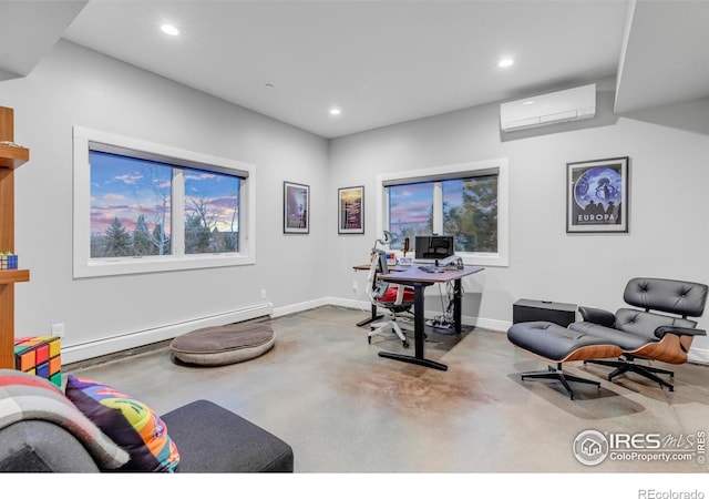 office space featuring baseboard heating, an AC wall unit, concrete floors, recessed lighting, and baseboards