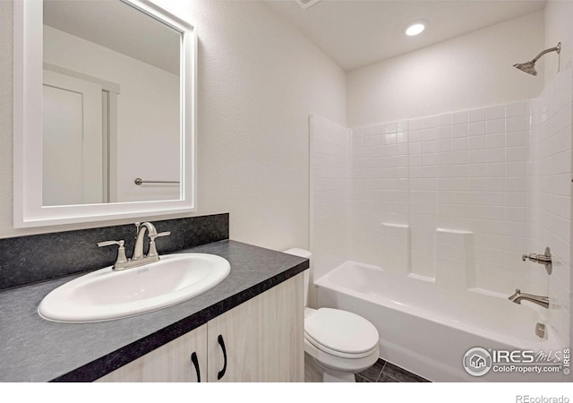 bathroom with recessed lighting, vanity, toilet, and bathing tub / shower combination