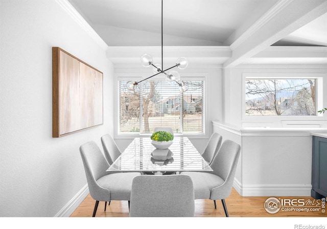 3380 Longwood Ave, Boulder, CO 80305 - dining room with baseboards, light wood-style floors, a chandelier, and vaulted ceiling