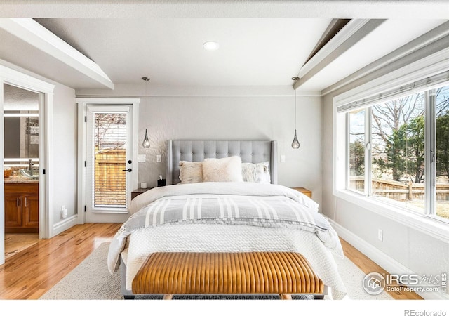 3380 Longwood Ave, Boulder, CO 80305 - bedroom featuring access to exterior, baseboards, and light wood finished floors