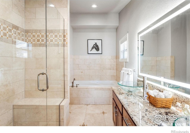 3380 Longwood Ave, Boulder, CO 80305 - full bath with recessed lighting, a shower stall, tile patterned flooring, a bath, and vanity