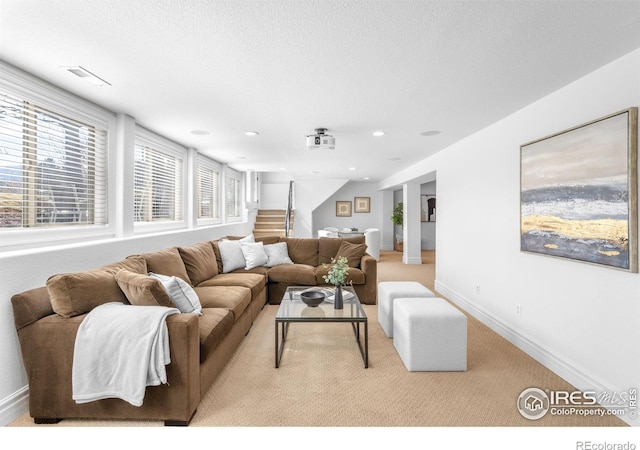 3380 Longwood Ave, Boulder, CO 80305 - living area featuring stairs, baseboards, visible vents, and a textured ceiling