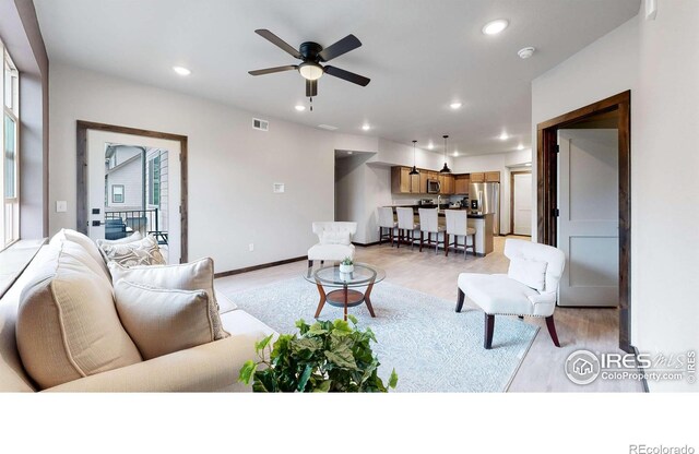 1734 Wildfire Rd Unit 204, Estes Park, CO 80517 - living room featuring light wood-style floors, ceiling fan, and recessed lighting