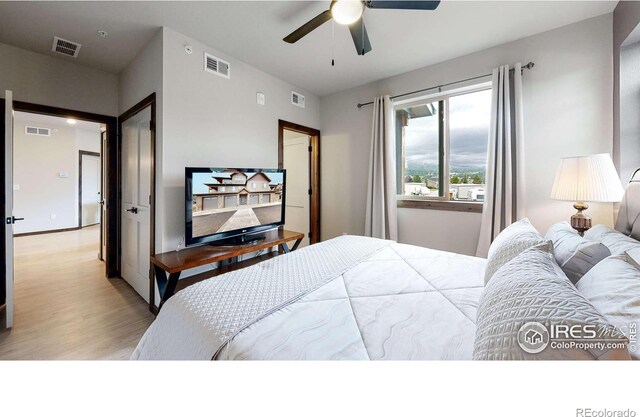 1734 Wildfire Rd Unit 204, Estes Park, CO 80517 - bedroom featuring wood finished floors and a ceiling fan