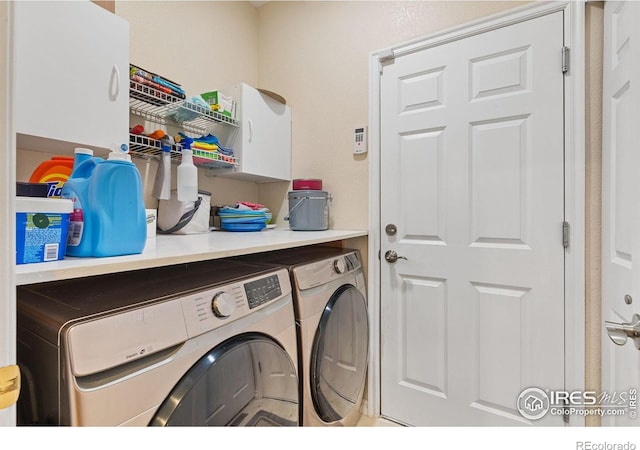 laundry room featuring laundry area and washing machine and clothes dryer