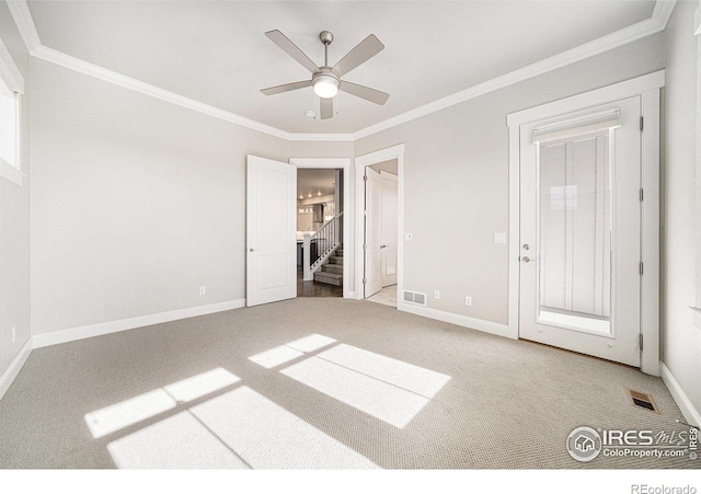 4300 Ardglass Ln, Timnath, CO 80547 - unfurnished bedroom with carpet flooring, crown molding, baseboards, ensuite bath, and ceiling fan