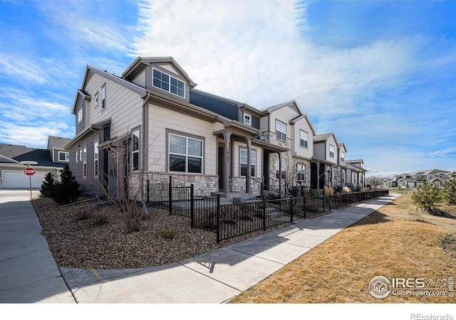 4300 Ardglass Ln, Timnath, CO 80547 - view of front facade featuring a residential view and stone siding