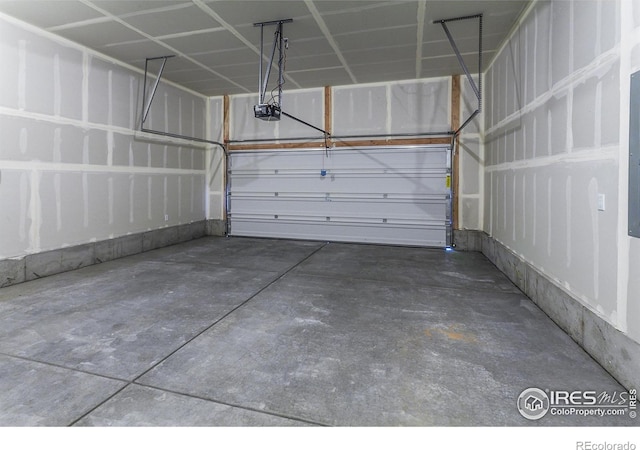 garage featuring a garage door opener