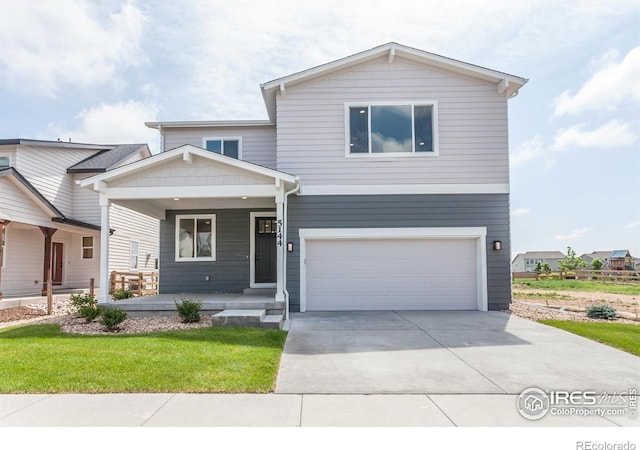 5144 Beckworth St, Timnath, CO 80547 - view of front of home featuring a porch, an attached garage, driveway, and a front yard