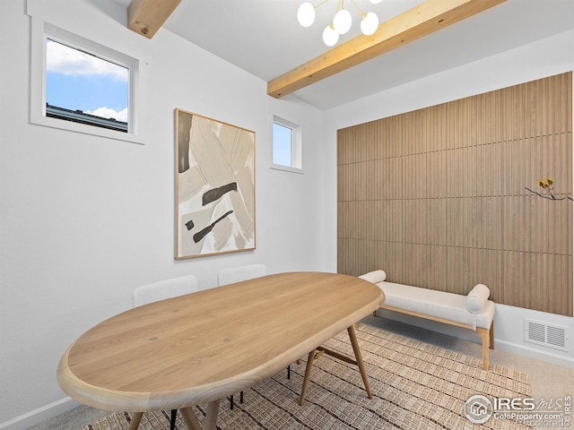 2412 Cottongrass Ave, Loveland, CO 80538 - dining room featuring carpet flooring, an inviting chandelier, baseboards, beam ceiling, and visible vents