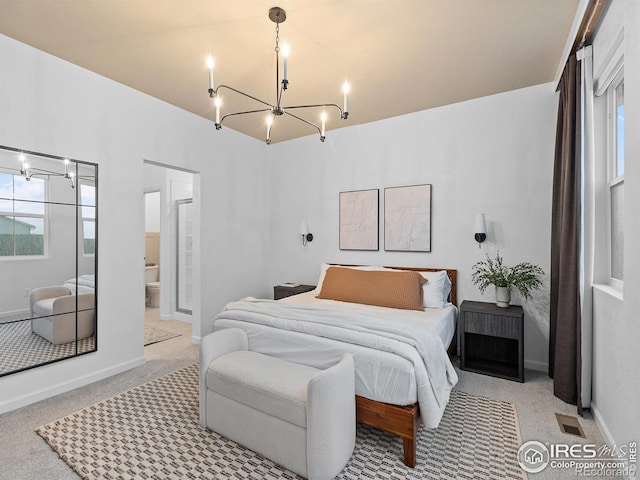 2412 Cottongrass Ave, Loveland, CO 80538 - bedroom featuring carpet floors, a chandelier, ensuite bath, baseboards, and visible vents