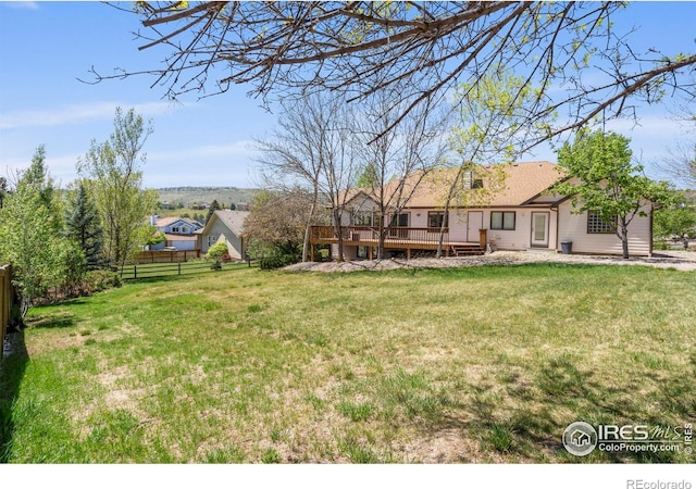 2409 Denby Ct, Fort Collins, CO 80526 - view of yard featuring a wooden deck