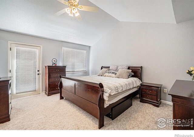 2409 Denby Ct, Fort Collins, CO 80526 - bedroom with lofted ceiling, light colored carpet, a ceiling fan, and baseboards