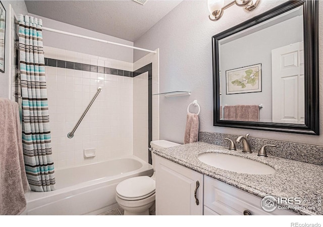 2409 Denby Ct, Fort Collins, CO 80526 - bathroom with shower / bath combination with curtain, toilet, vanity, a textured ceiling, and a textured wall