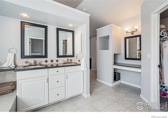2409 Denby Ct, Fort Collins, CO 80526 - full bathroom with tile patterned flooring, double vanity, decorative backsplash, baseboards, and recessed lighting