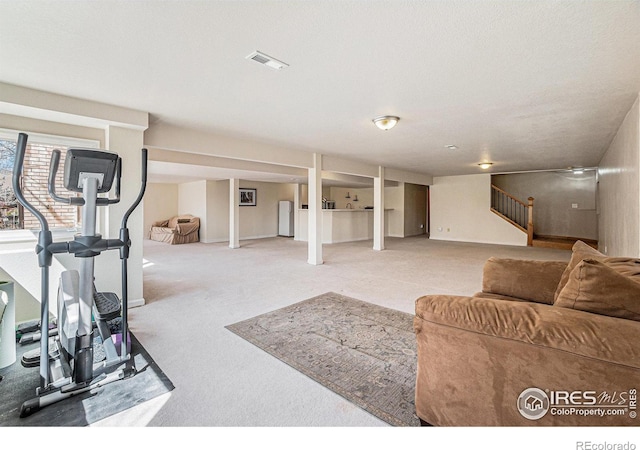 2409 Denby Ct, Fort Collins, CO 80526 - living room featuring stairway, carpet flooring, and baseboards