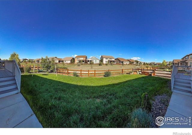 view of yard featuring a residential view