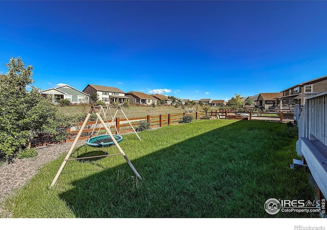 view of yard with a residential view