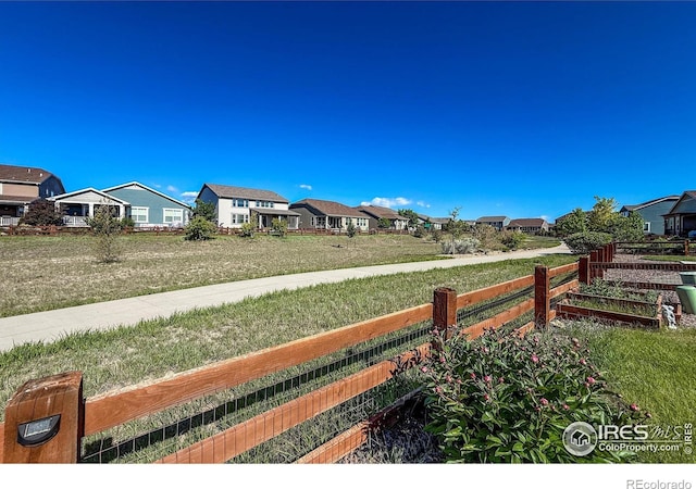 view of yard with a residential view
