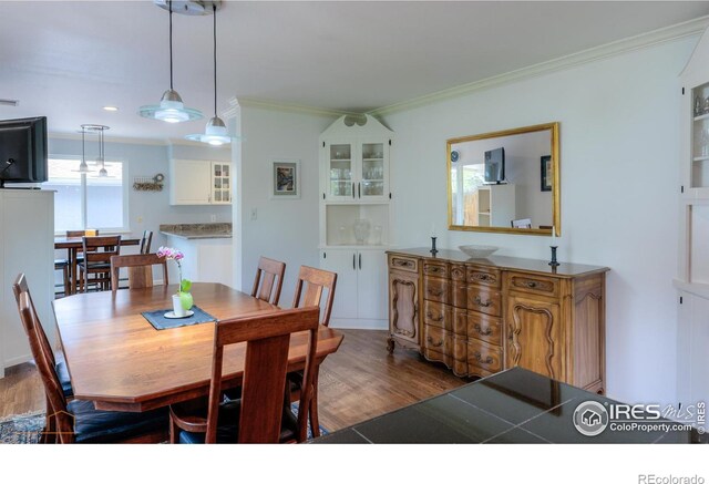 873 Cypress Dr, Boulder, CO 80303 - dining room with crown molding and wood finished floors