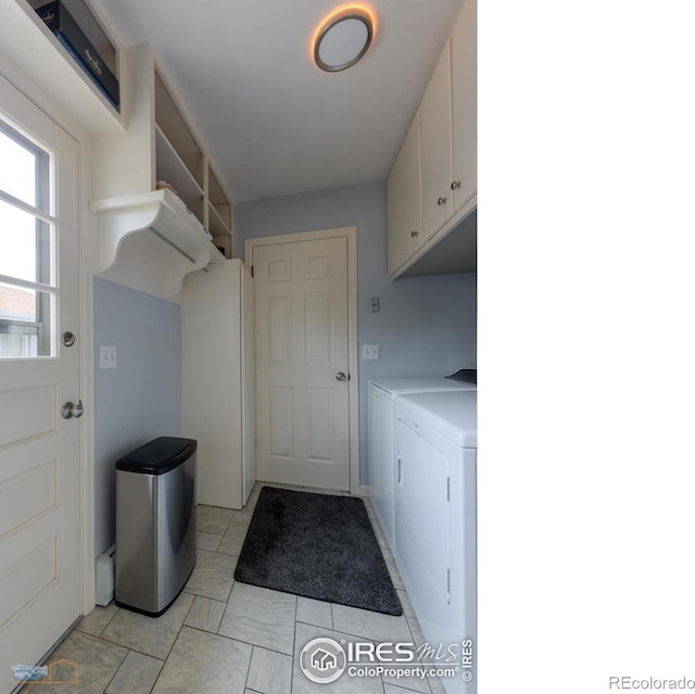 873 Cypress Dr, Boulder, CO 80303 - laundry area featuring washing machine and clothes dryer and cabinet space