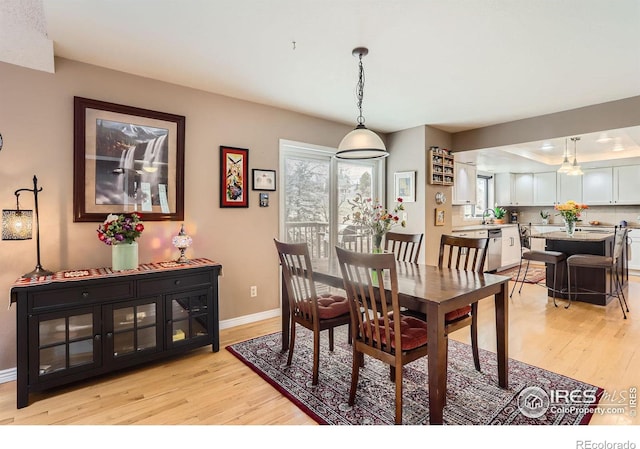 4057 Niblick Dr, Longmont, CO 80503 - dining space with light wood-type flooring and baseboards