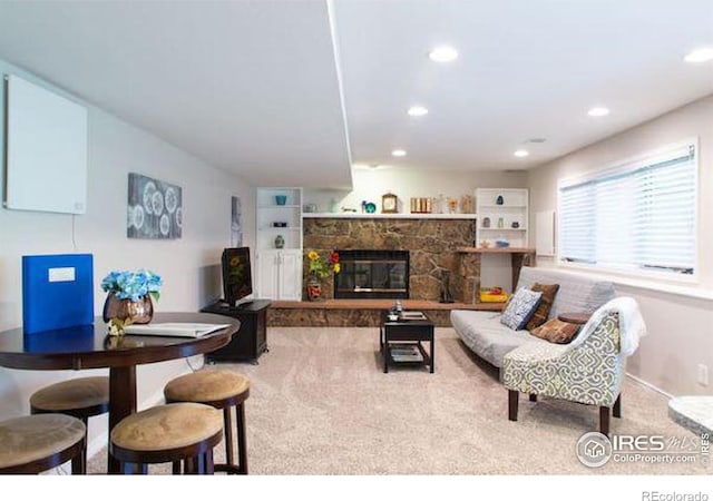 4057 Niblick Dr, Longmont, CO 80503 - carpeted living room featuring recessed lighting and a fireplace