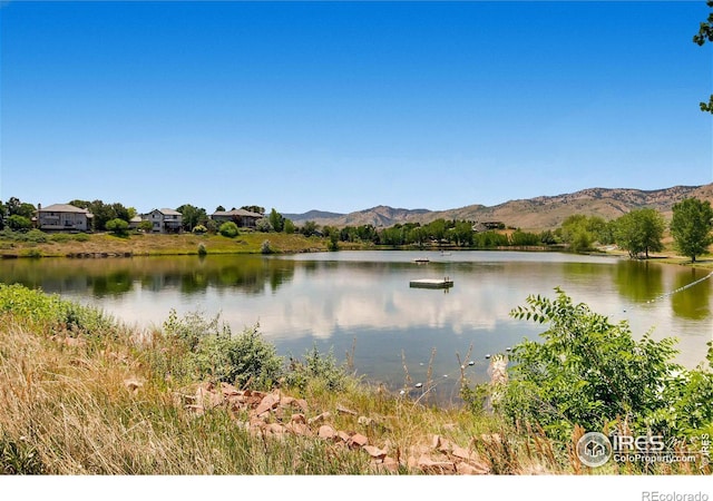 4057 Niblick Dr, Longmont, CO 80503 - water view featuring mountains
