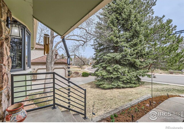 4057 Niblick Dr, Longmont, CO 80503 - view of yard with a garage