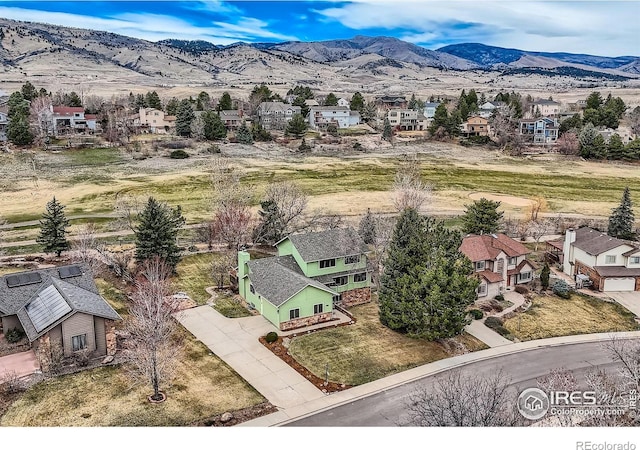 4057 Niblick Dr, Longmont, CO 80503 - aerial view of residential area with a mountain backdrop