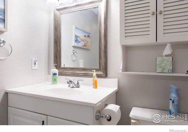 4057 Niblick Dr, Longmont, CO 80503 - bathroom featuring vanity and toilet