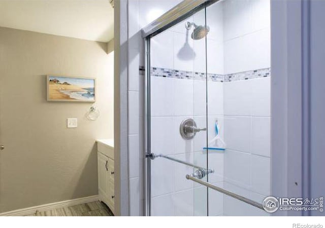 4057 Niblick Dr, Longmont, CO 80503 - full bathroom featuring a stall shower and vanity