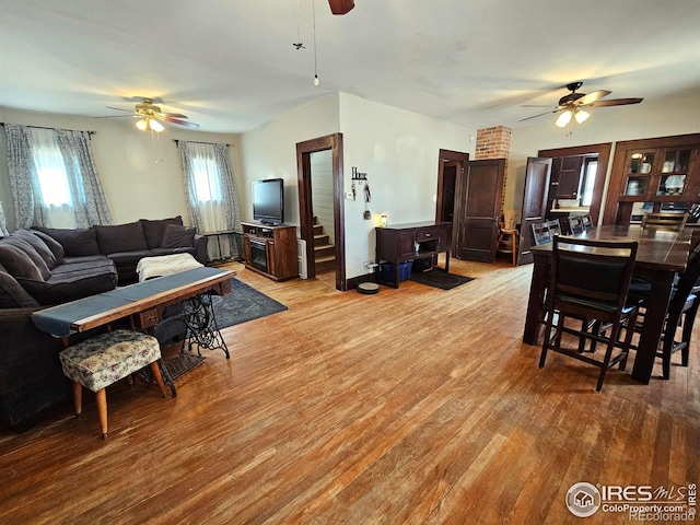 704 S 3rd Ave, Sterling, CO 80751 - living room featuring a ceiling fan, baseboards, and wood finished floors