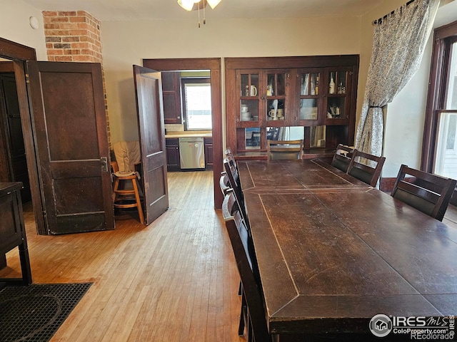 704 S 3rd Ave, Sterling, CO 80751 - dining space featuring ceiling fan and hardwood / wood-style floors