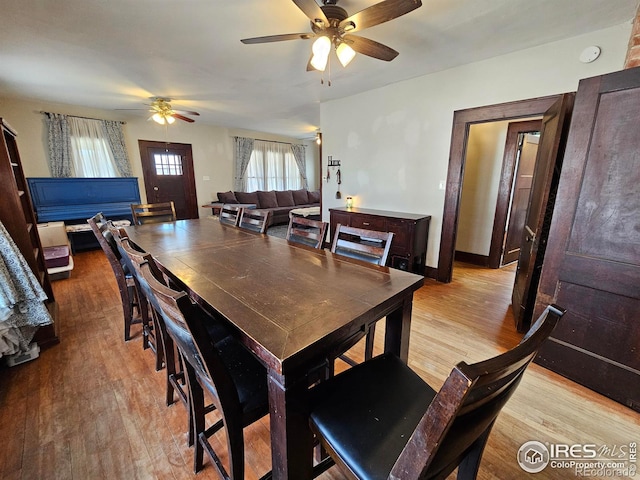 704 S 3rd Ave, Sterling, CO 80751 - dining room with a ceiling fan and wood finished floors