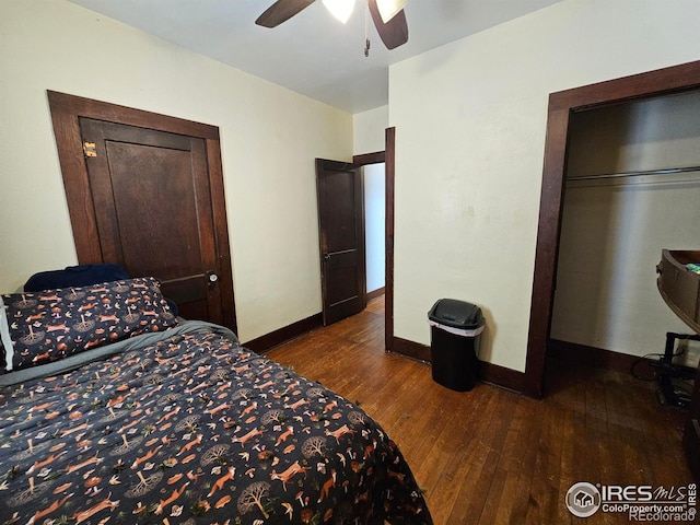 704 S 3rd Ave, Sterling, CO 80751 - bedroom featuring baseboards, ceiling fan, and dark wood-style flooring