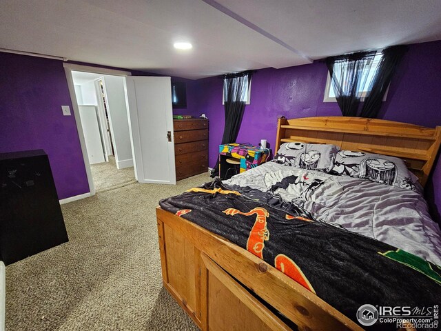 704 S 3rd Ave, Sterling, CO 80751 - carpeted bedroom featuring baseboards