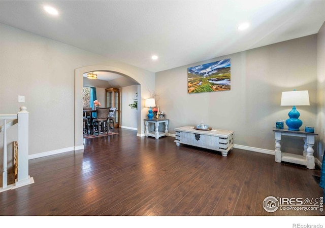 2821 5th St SW, Loveland, CO 80537 - interior space featuring recessed lighting, arched walkways, wood finished floors, and baseboards