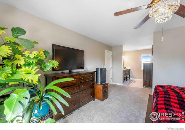 2821 5th St SW, Loveland, CO 80537 - carpeted bedroom featuring ceiling fan and baseboards