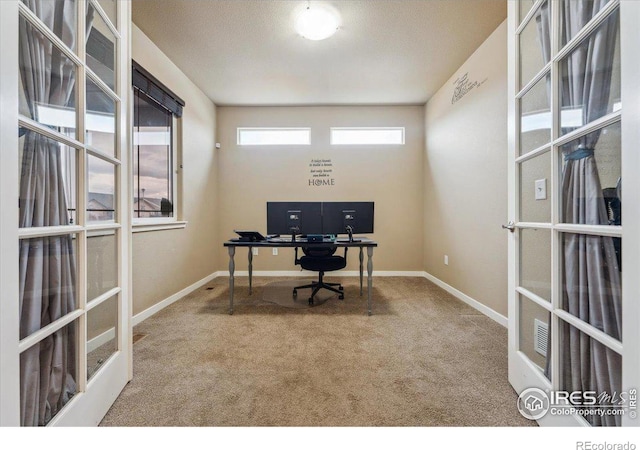 403 S Maple Ave, Eaton, CO 80615 - office area with carpet floors, baseboards, and french doors