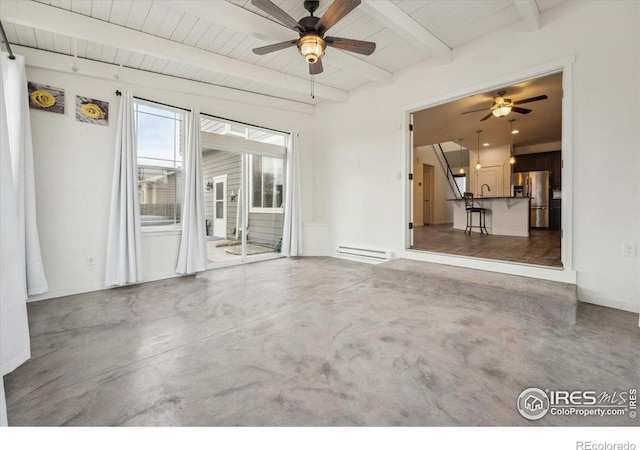 403 S Maple Ave, Eaton, CO 80615 - unfurnished living room with baseboard heating, ceiling fan, concrete flooring, beam ceiling, and wooden ceiling