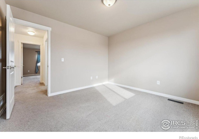 403 S Maple Ave, Eaton, CO 80615 - carpeted empty room with baseboards