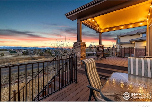 1046 Greens Pl, Erie, CO 80516 - wooden deck featuring outdoor dining area