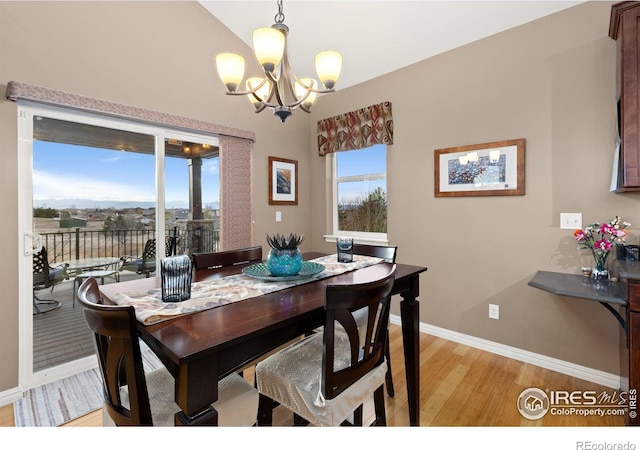 1046 Greens Pl, Erie, CO 80516 - dining space with light wood finished floors, a chandelier, and baseboards