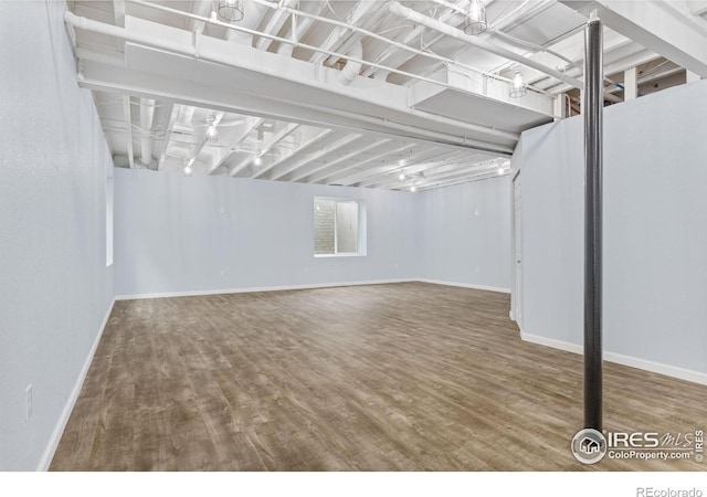 1863 Pioneer Cir, Lafayette, CO 80026 - below grade area featuring wood finished floors