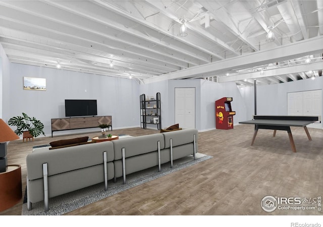 1863 Pioneer Cir, Lafayette, CO 80026 - living area with wood finished floors and baseboards