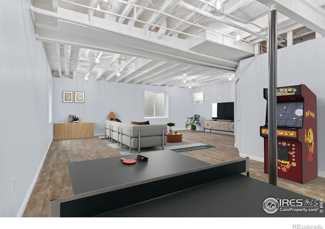 1863 Pioneer Cir, Lafayette, CO 80026 - game room with wood finished floors and baseboards