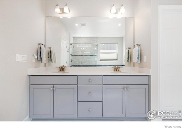 1863 Pioneer Cir, Lafayette, CO 80026 - bathroom with a stall shower and double vanity