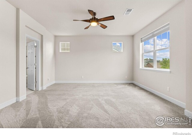 1863 Pioneer Cir, Lafayette, CO 80026 - empty room with ceiling fan and carpet flooring